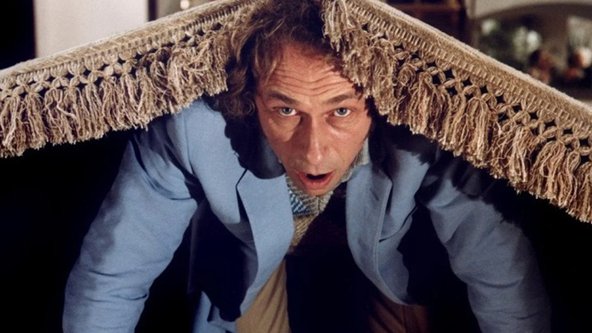 Dūriens ar lietussargu