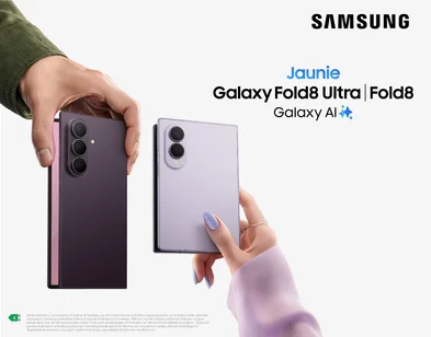 Samsung Galaxy Unpacked reklāma. Centrā atvērta baltas krāsas kartīte ar svītrkoda grafiku augšējā daļā. Zem attēla teksts "Galaxy Unpacked", datums "2026. gada 22. jūlijā" un norāde "Tiešraide: samsung.lv".